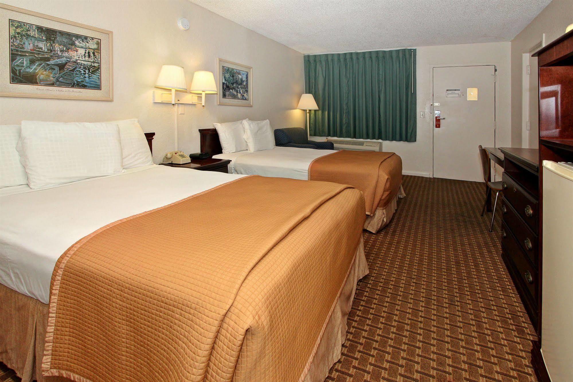 Super 8 By Wyndham Kissimmee Motel Bagian luar foto